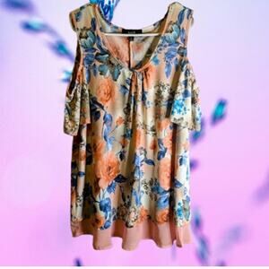 Naif XLG short sleeve cold shoulder floral polyester blend stretch woman's top.